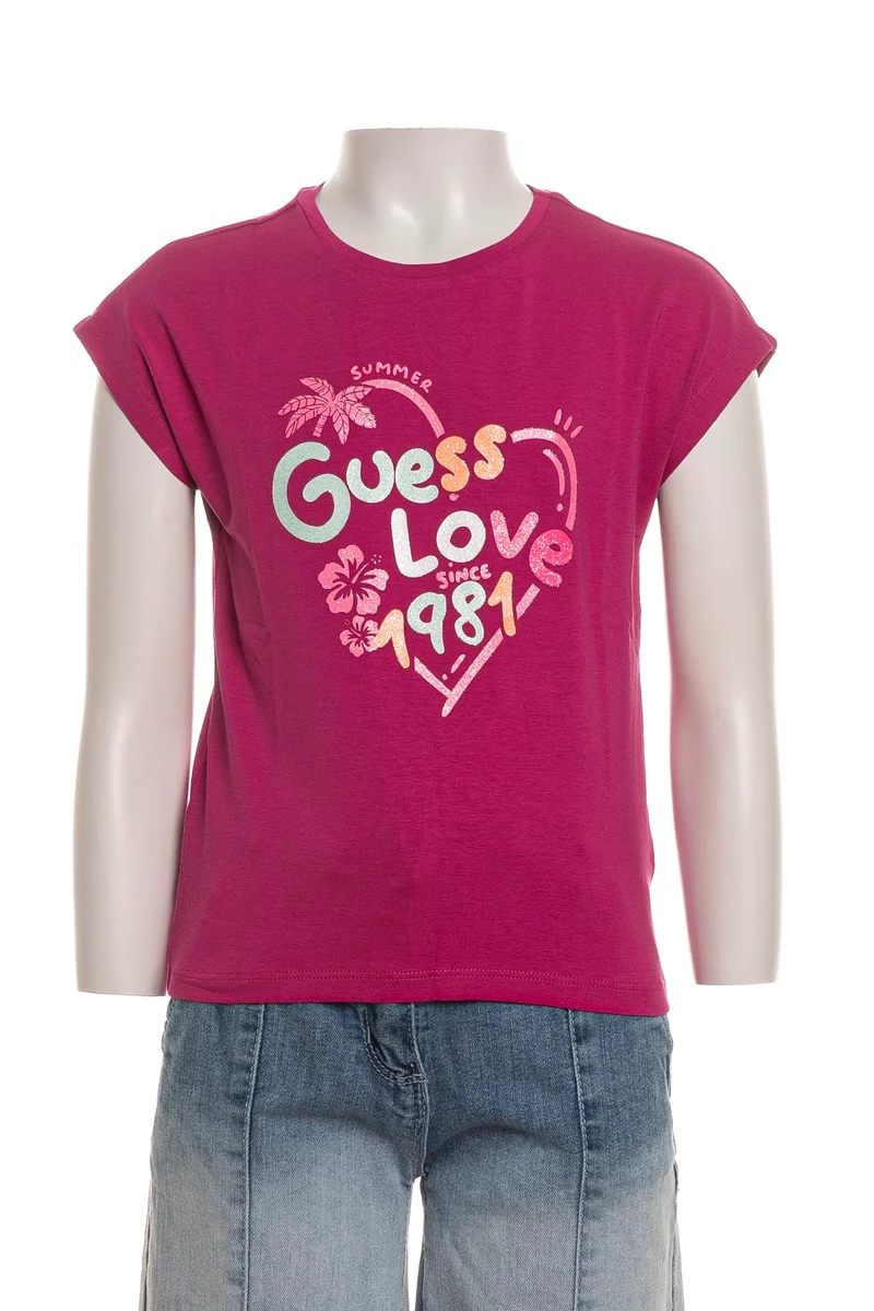 T Shirt Guess Glitter Tropical High Low Da Bambina Fuxia Ciclamino