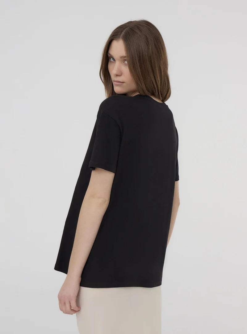 T-shirt ampia con stampa floreale