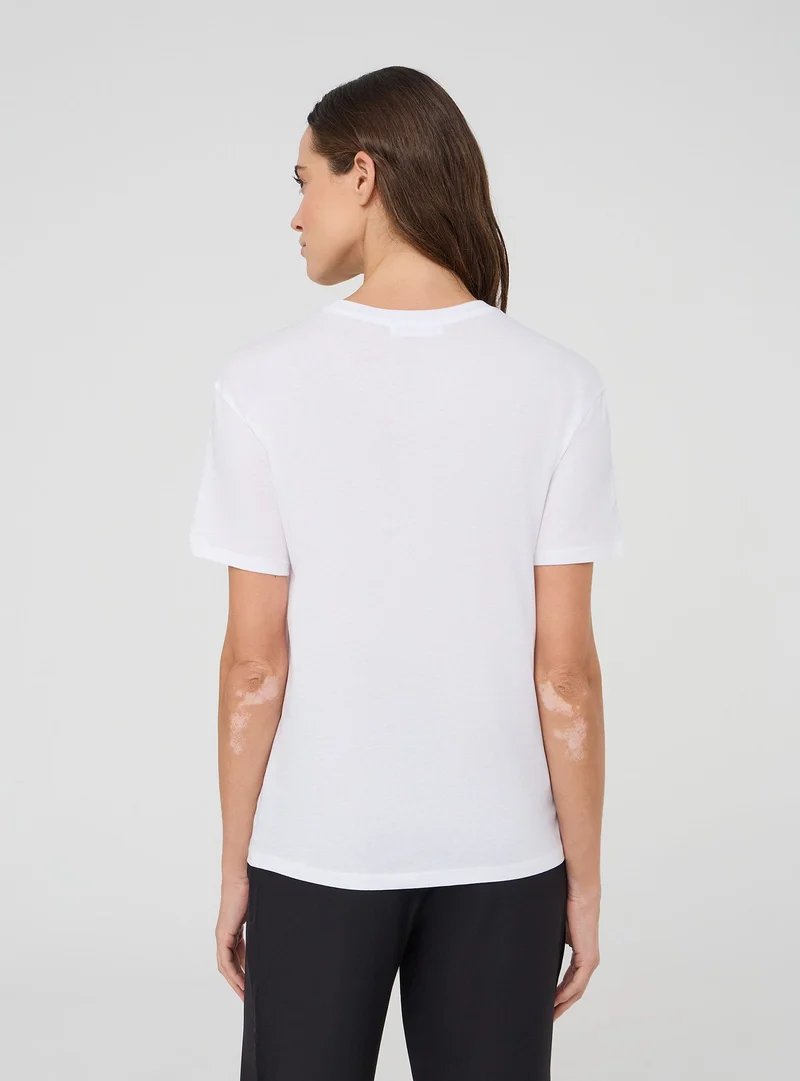 T-shirt ampia con scritta "Dolce far niente"
