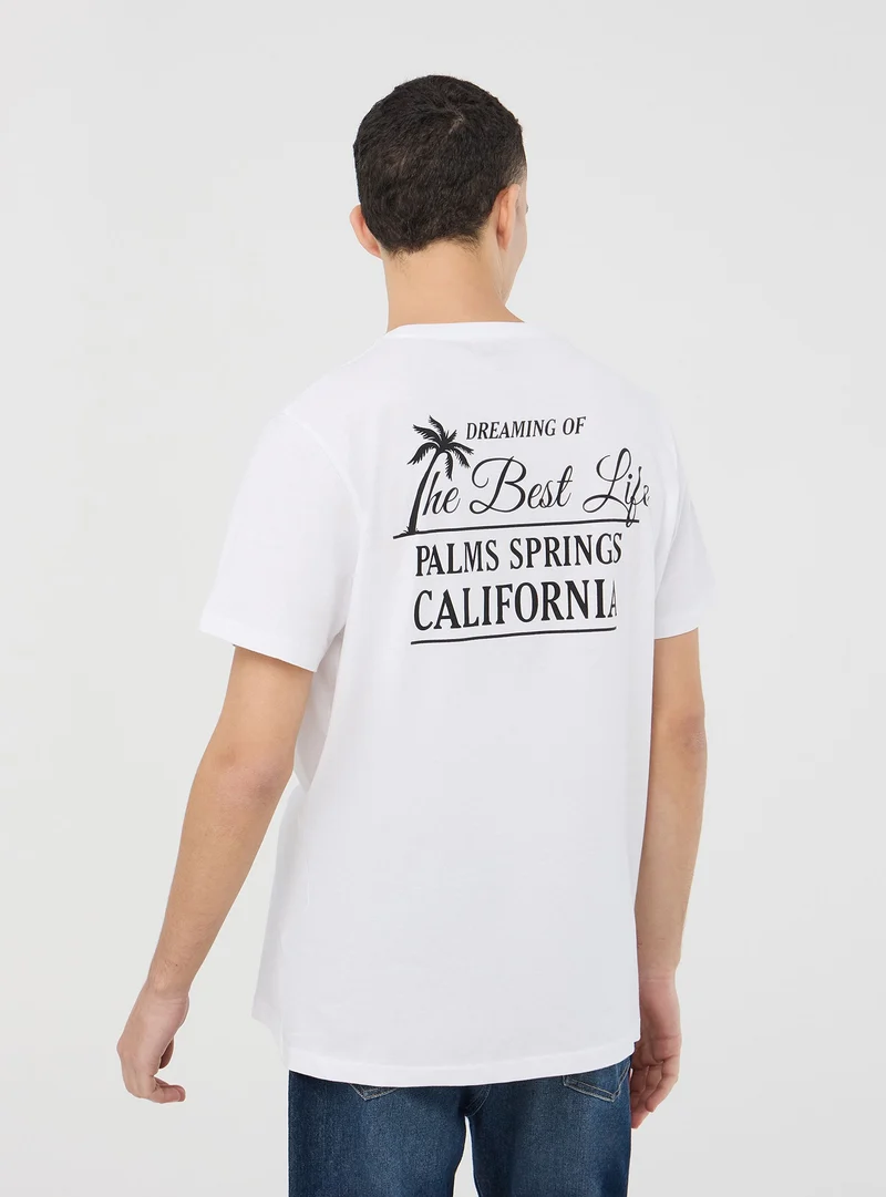 T-shirt con scritte fronte/retro