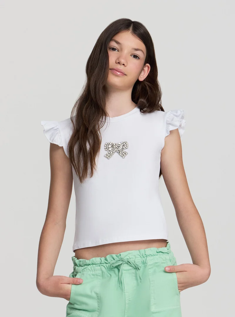 T-shirt con maniche a volant e applicazione fiocco gioiello
