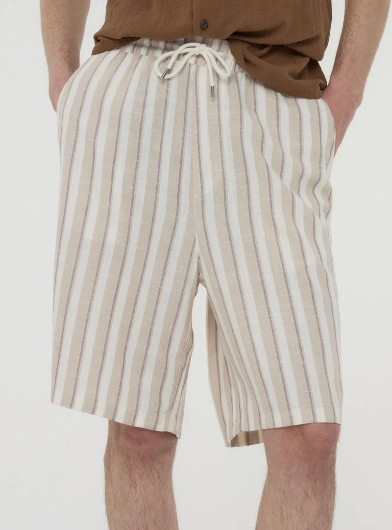 Pantaloncini a righe in misto lino