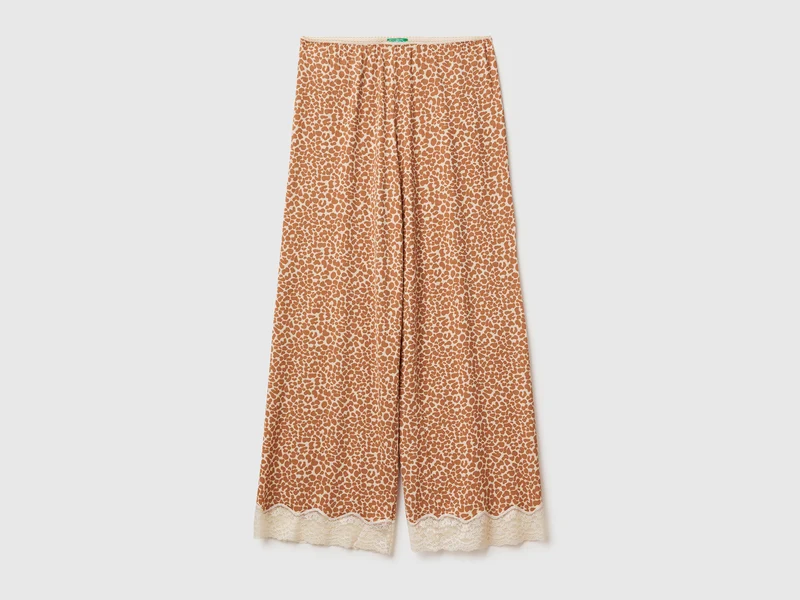 Pantaloni animalier con pizzo