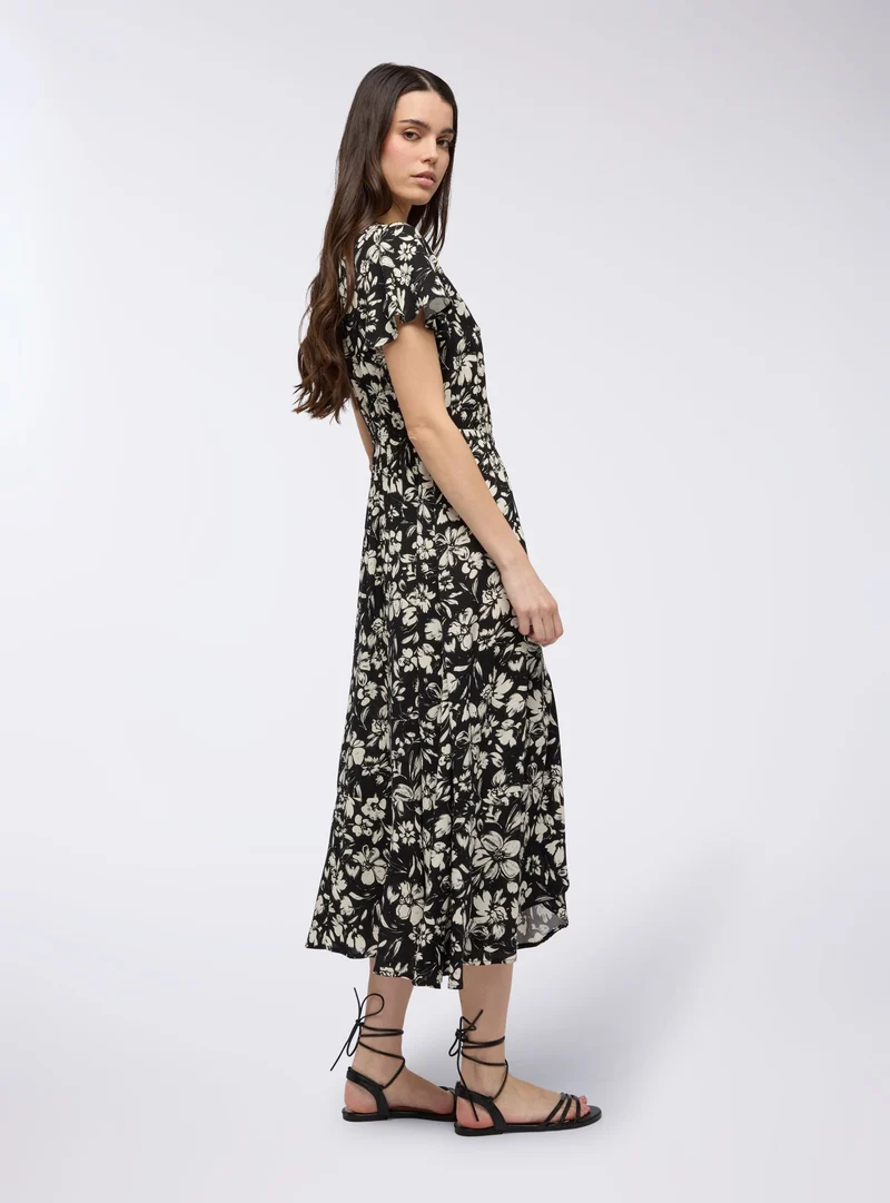 Vestito lungo a portafoglio con fiori grandi