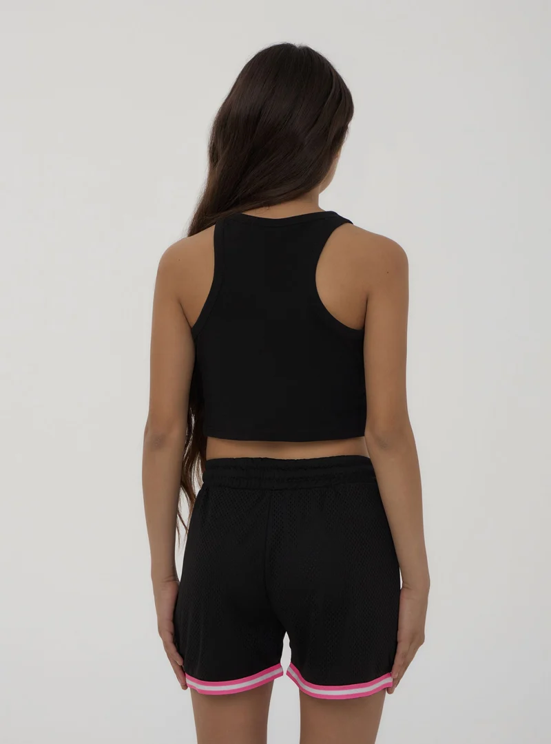 Shorts in rete stile basket con stampa