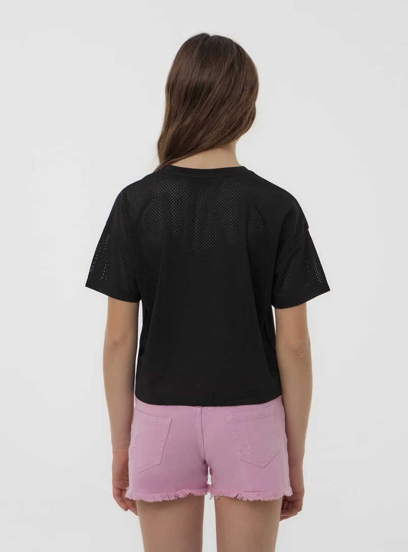 T-shirt a rete con stampa graffiti