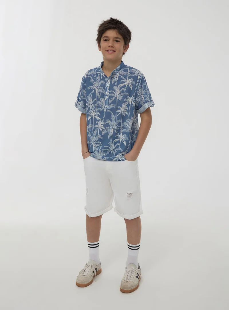 Pantaloncini jogger con strappi e coulisse