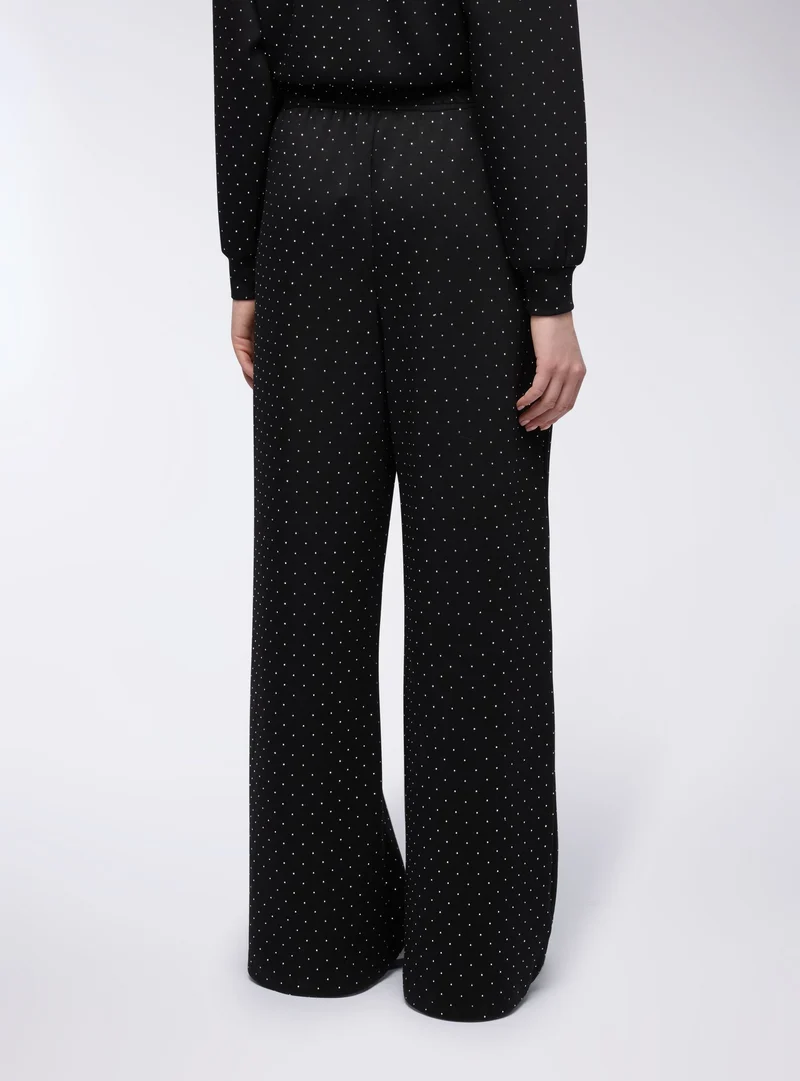 Pantaloni tuta wide leg con strass