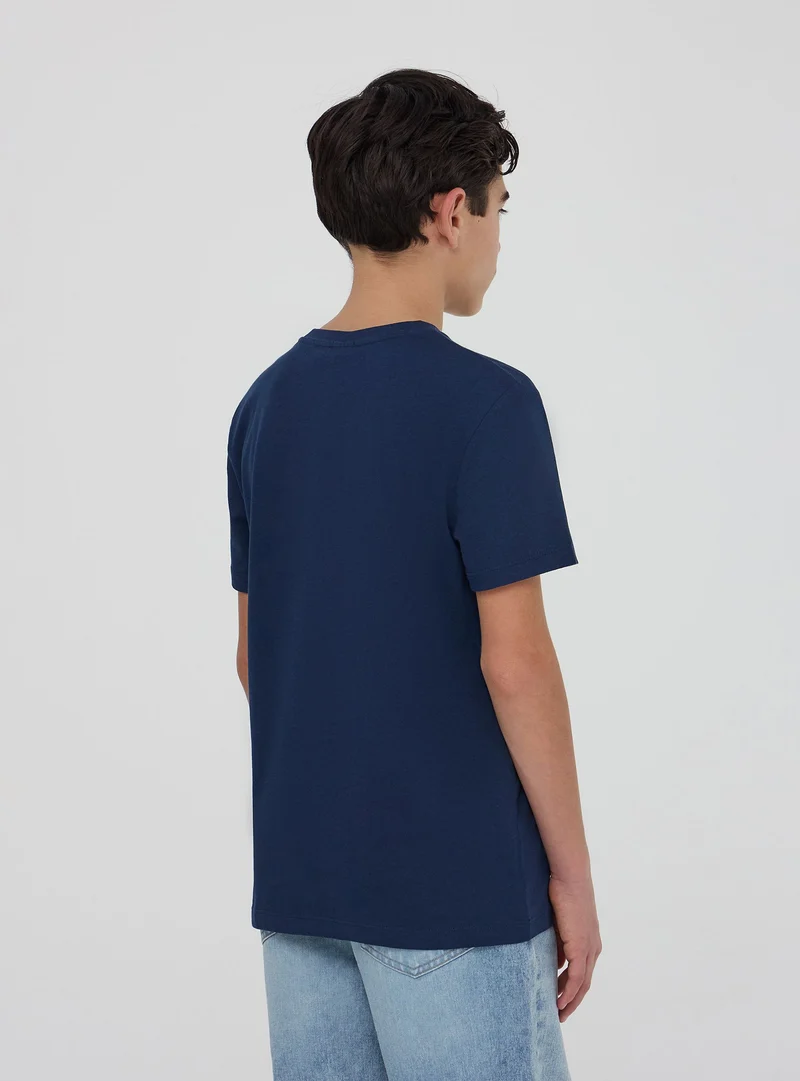 T-shirt con stampa bandiera