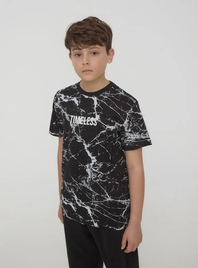 T-shirt con stampa marmorizzata all-over
