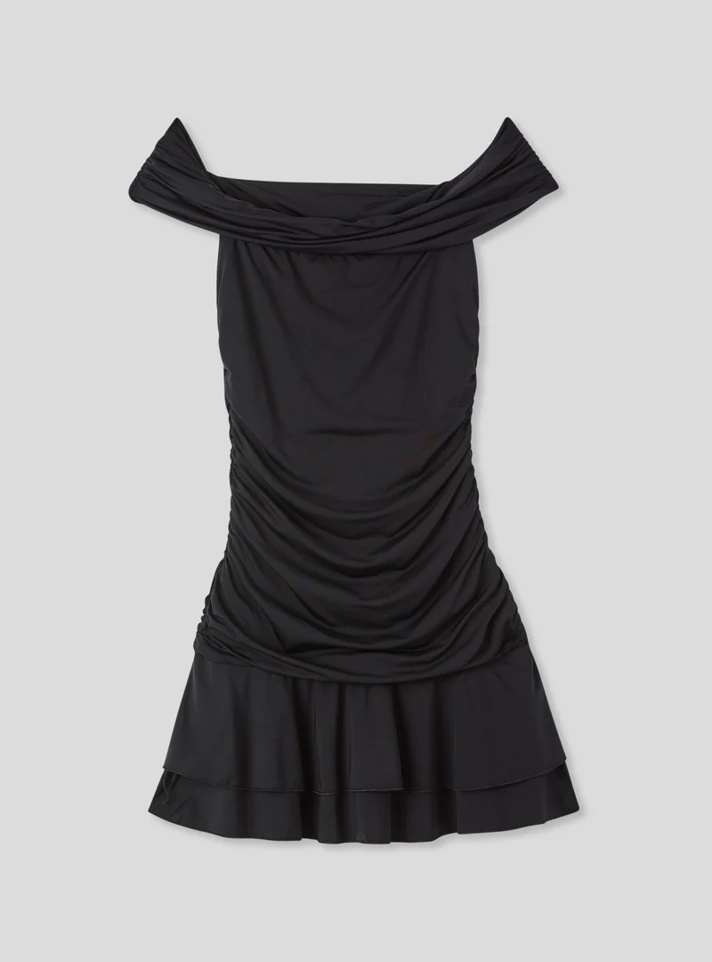 Vestito con drappeggio e balze