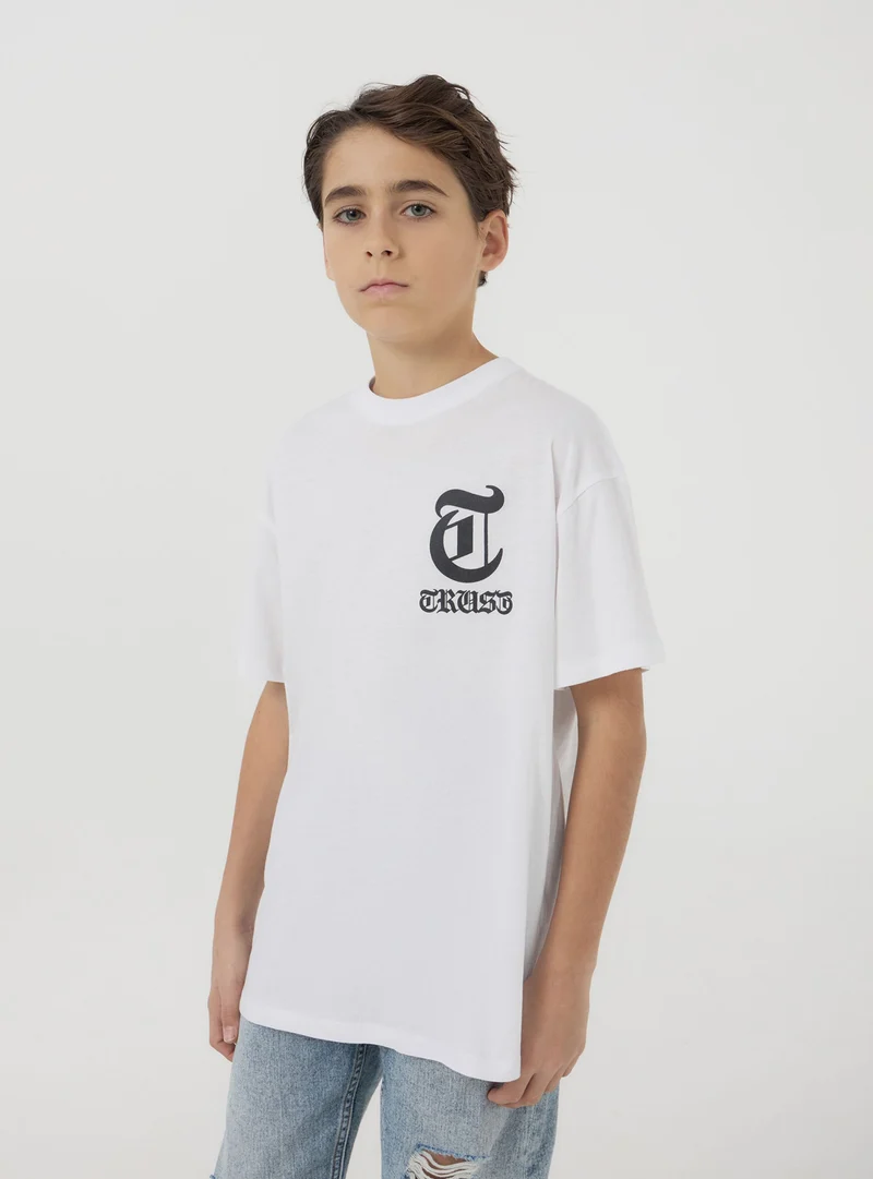 T-shirt con stampa ali sul retro
