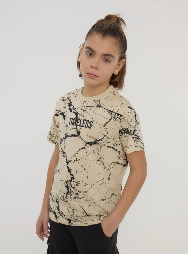 T-shirt con stampa marmorizzata all-over