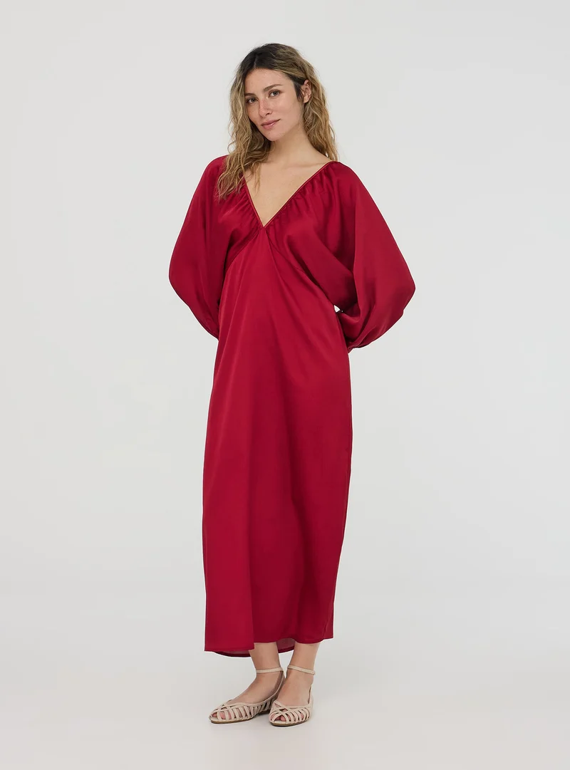Vestito lungo con maniche a pipistrello
