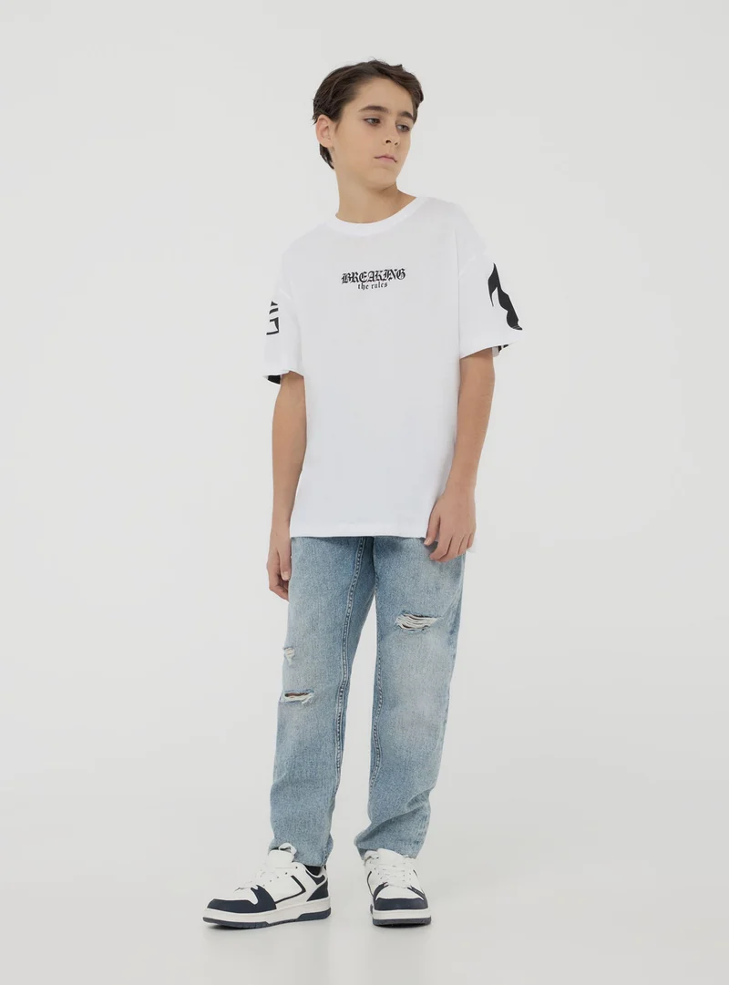T-shirt con stampa gotica fronte/retro