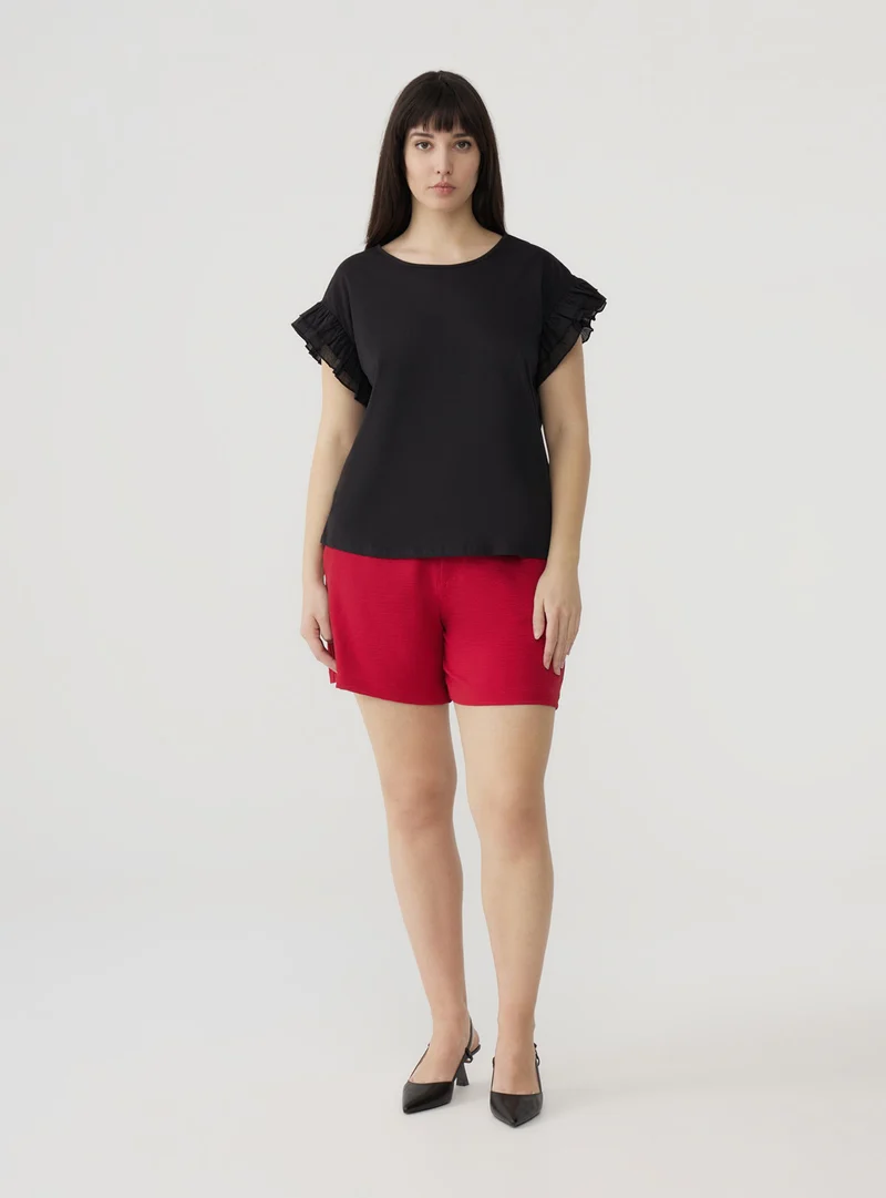 Shorts basic tinta unita