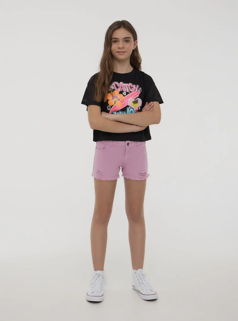 Shorts con strappi