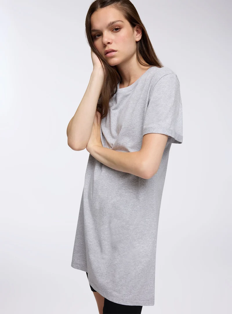 T-shirt maxi over a tinta unita
