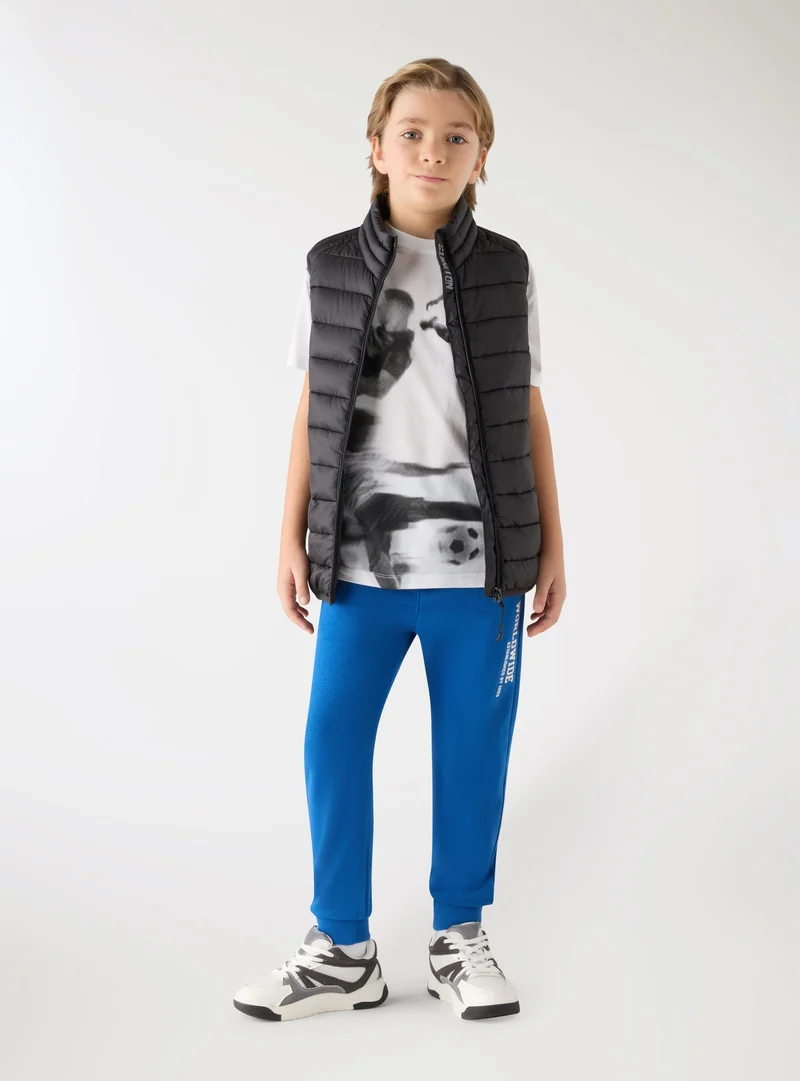 T-shirt con stampa calcio