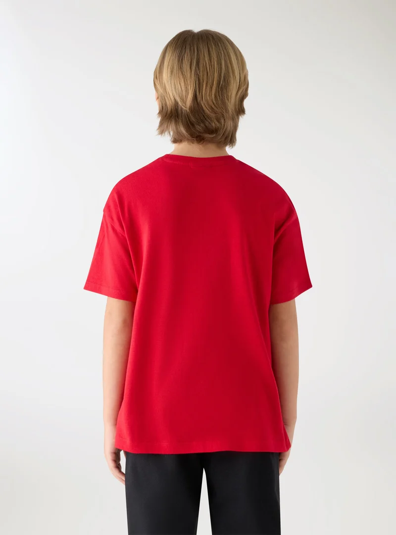 T-shirt con stampa calcio