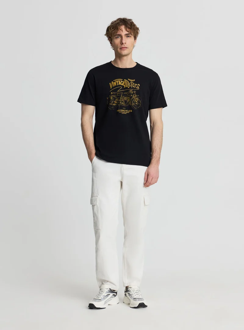 T-shirt con stampa moto vintage