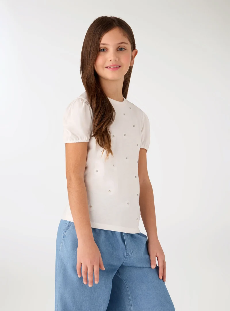 T-shirt con strass e maniche a palloncino