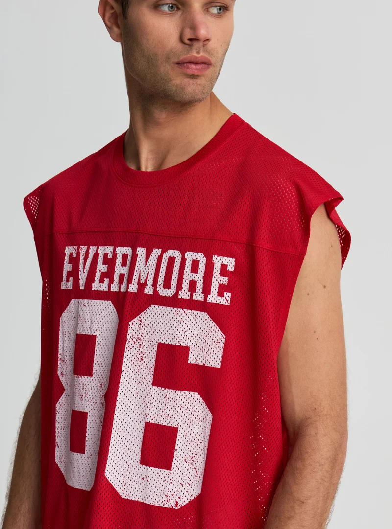 T-shirt boxy smanicata in rete con stampa college