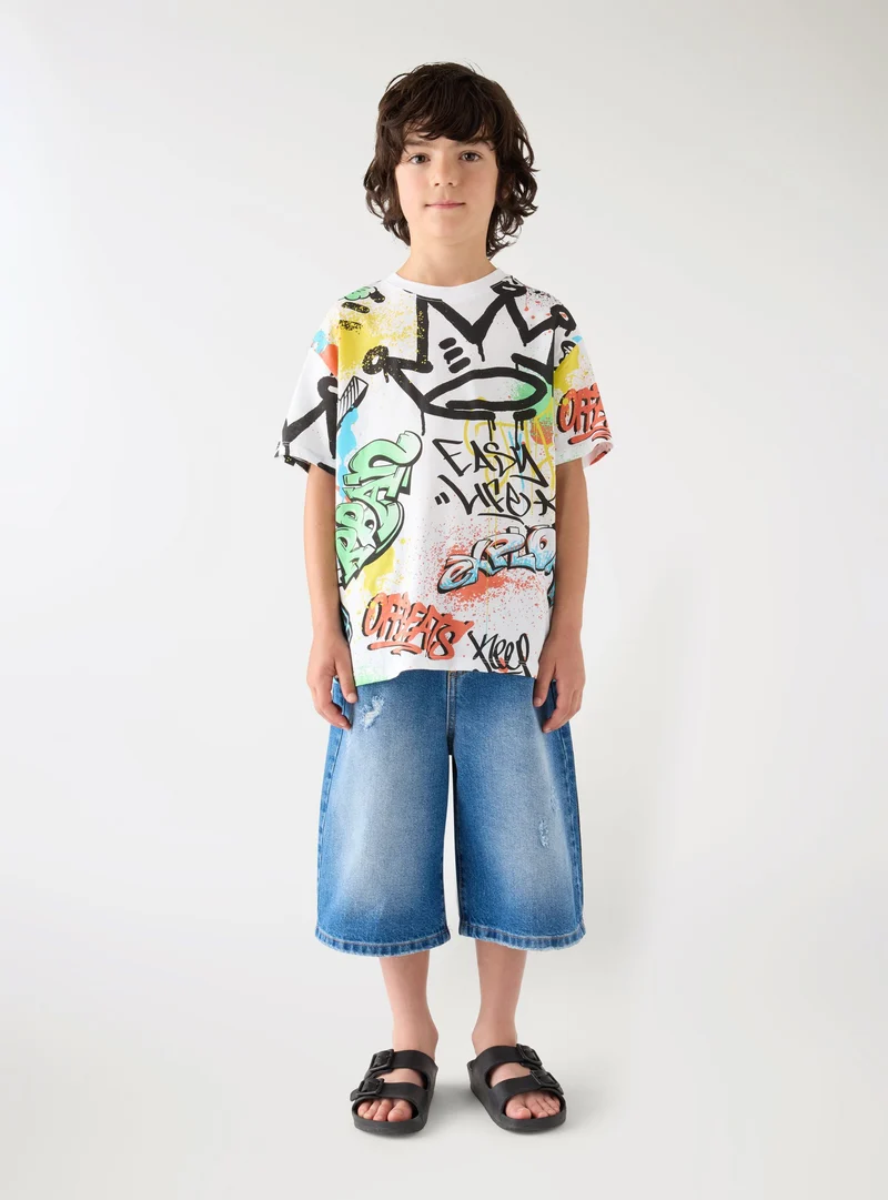 T-shirt stampa graffiti all-over