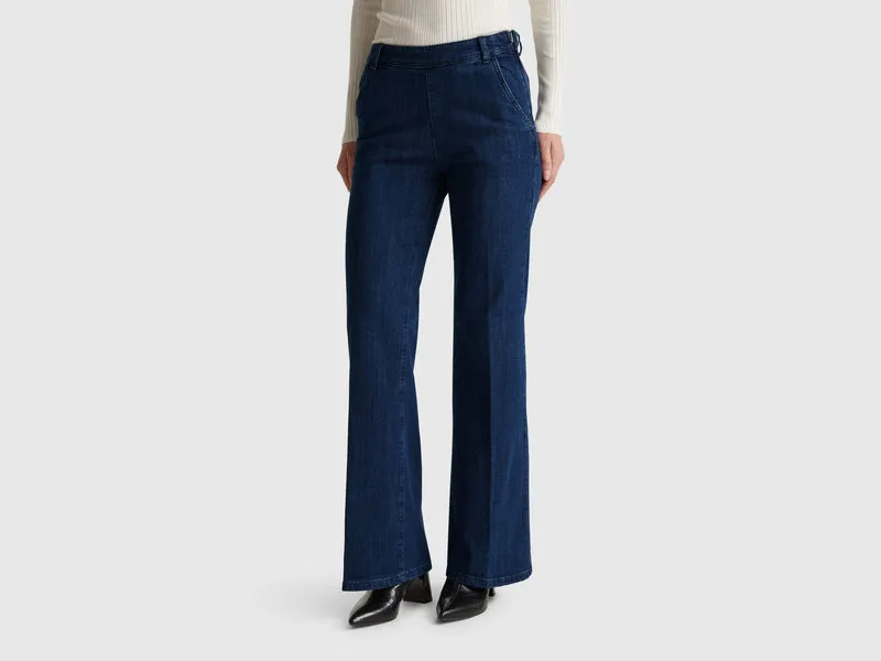 Jeans flare con zip
