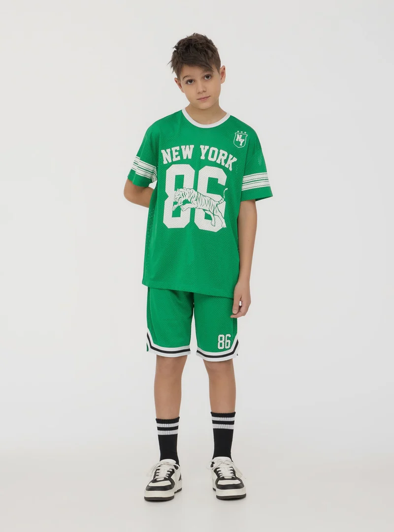 T-shirt a rete con stampa sportiva