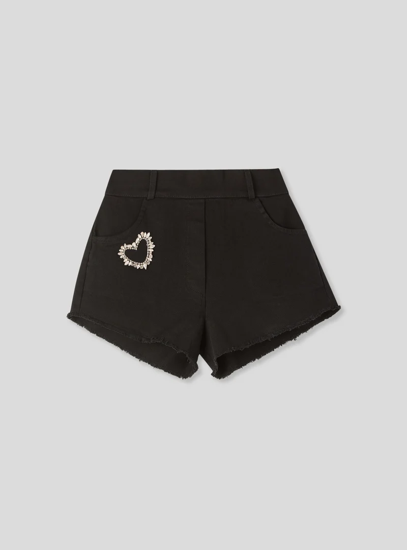 Shorts con applicazione cuore