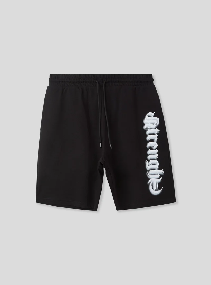 Bermuda tuta con scritta in stile gotico