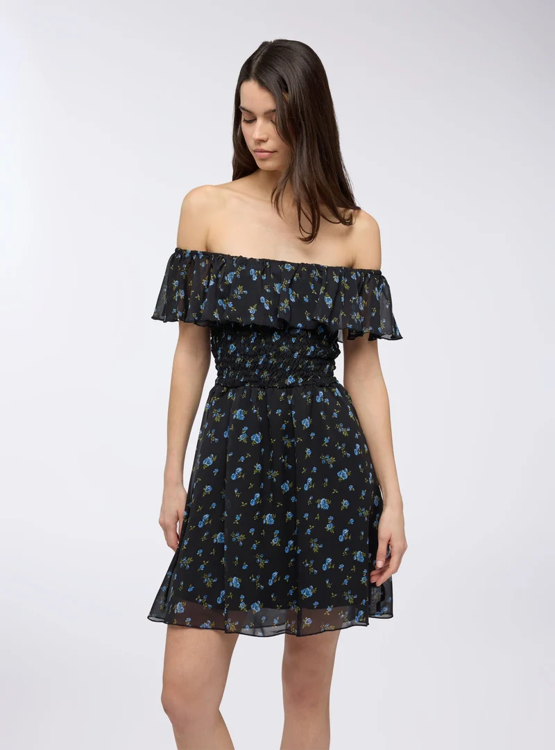Vestito floreale con balza e spalle scoperte