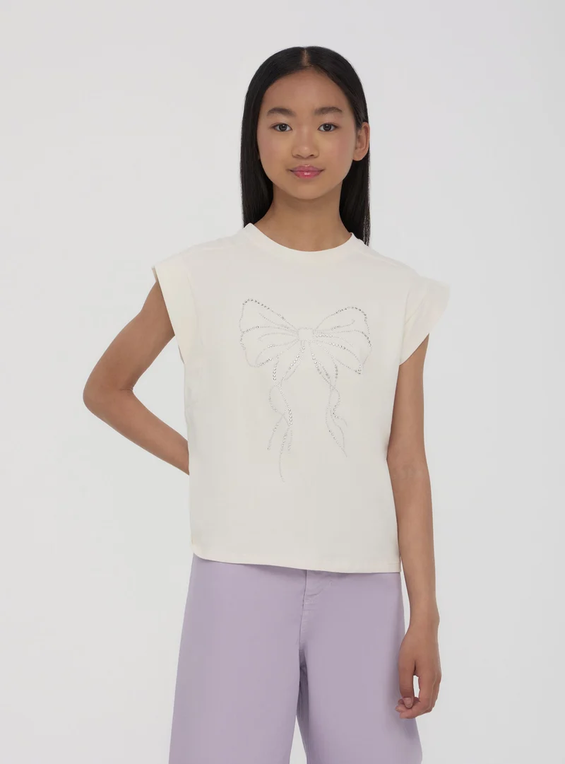 T-shirt con borchie a fiocco
