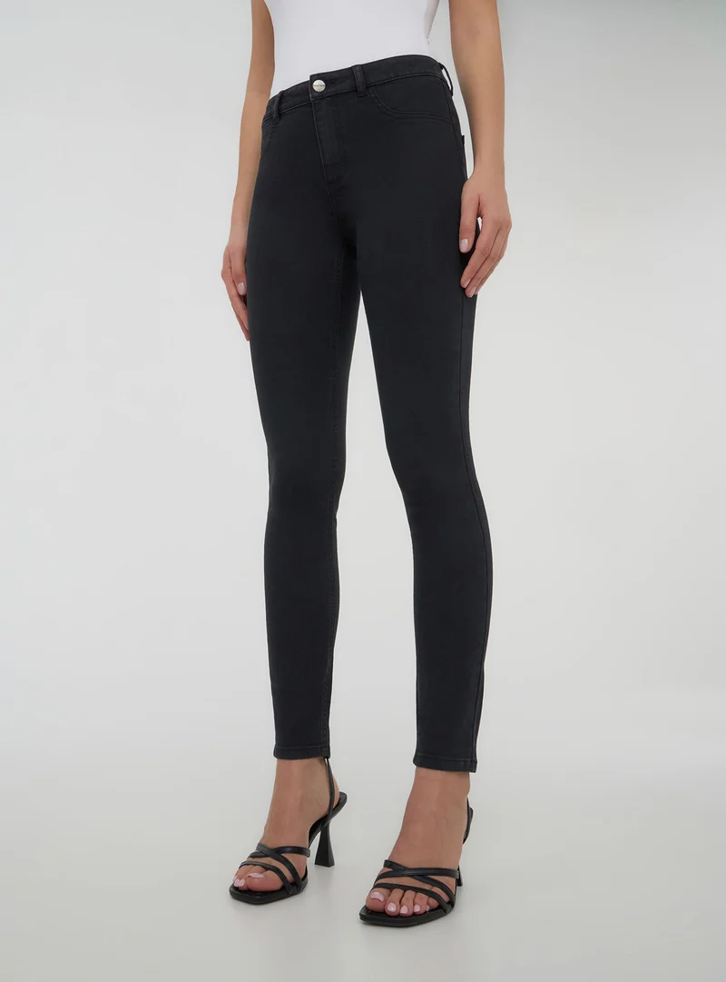 Jeggings scuri tinta unita
