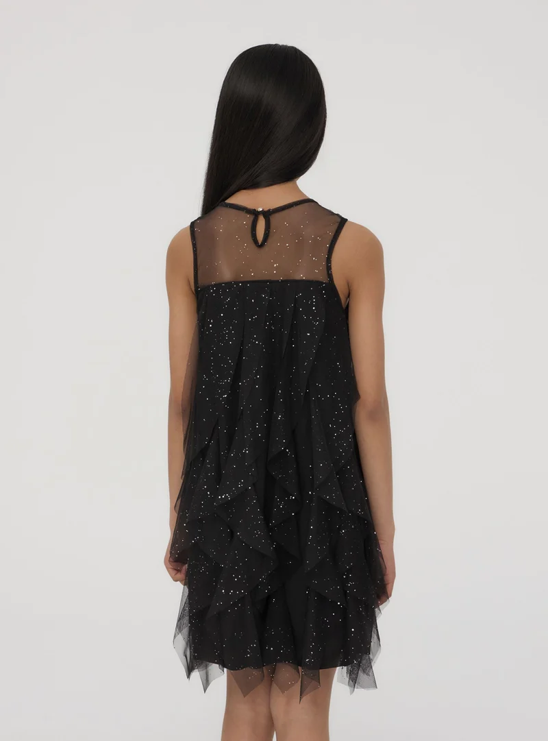 Vestito con balze verticali ed effetto luccicante