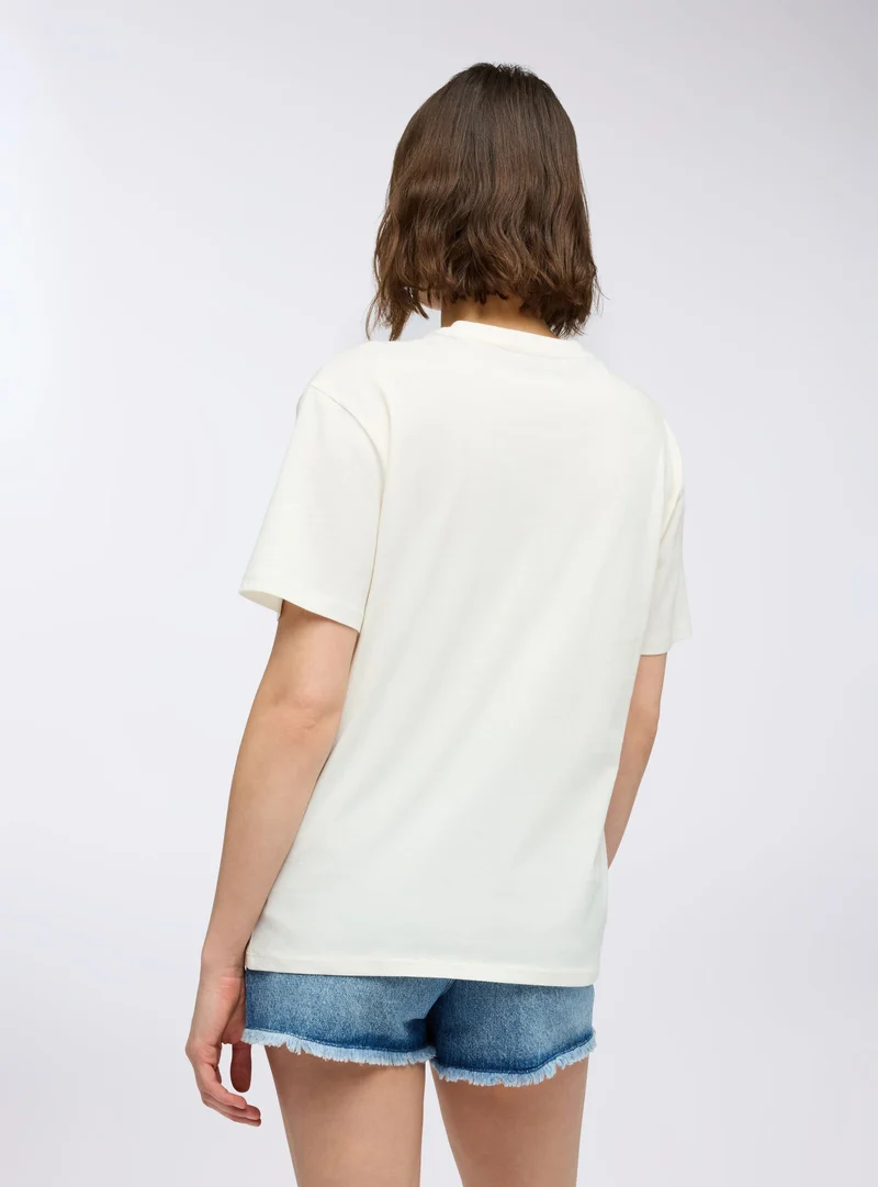 T-shirt ampia con ricamo effetto luccicante