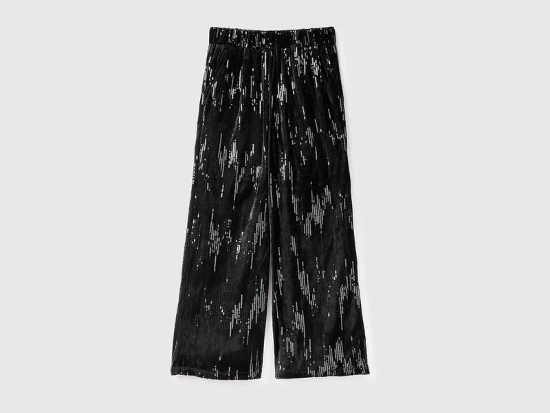 Pantaloni palazzo in velluto con paillettes