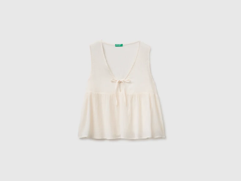 Top scollo a V con lacci