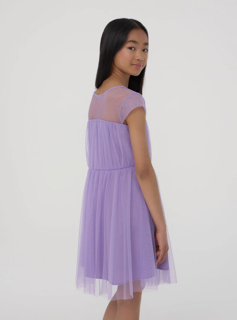 Vestito in tulle con fiore applicato