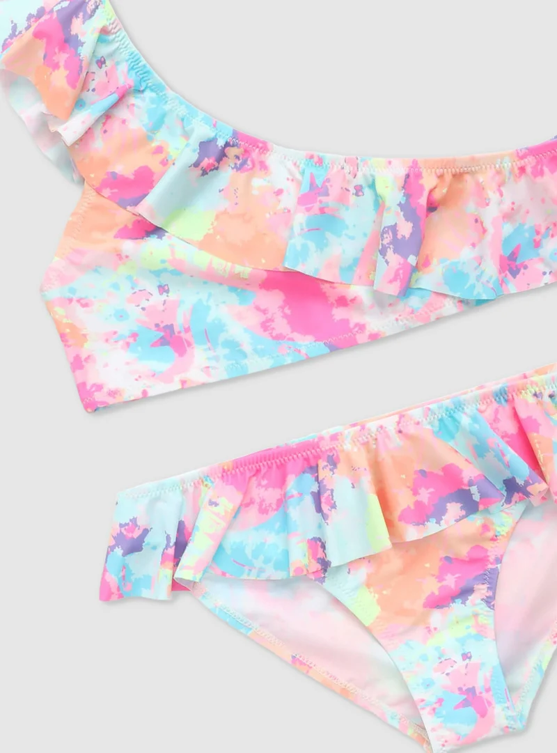 Bikini monospalla tie-dye con balza