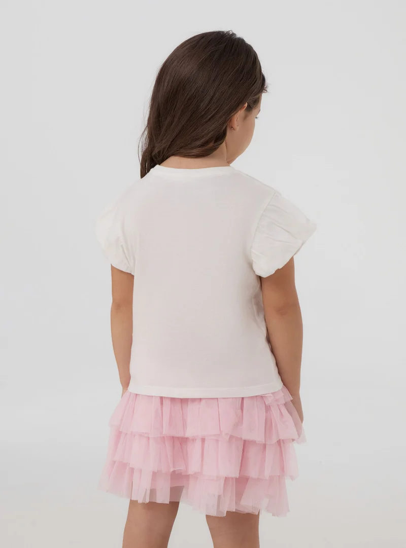 T-shirt con fiocco e scritta
