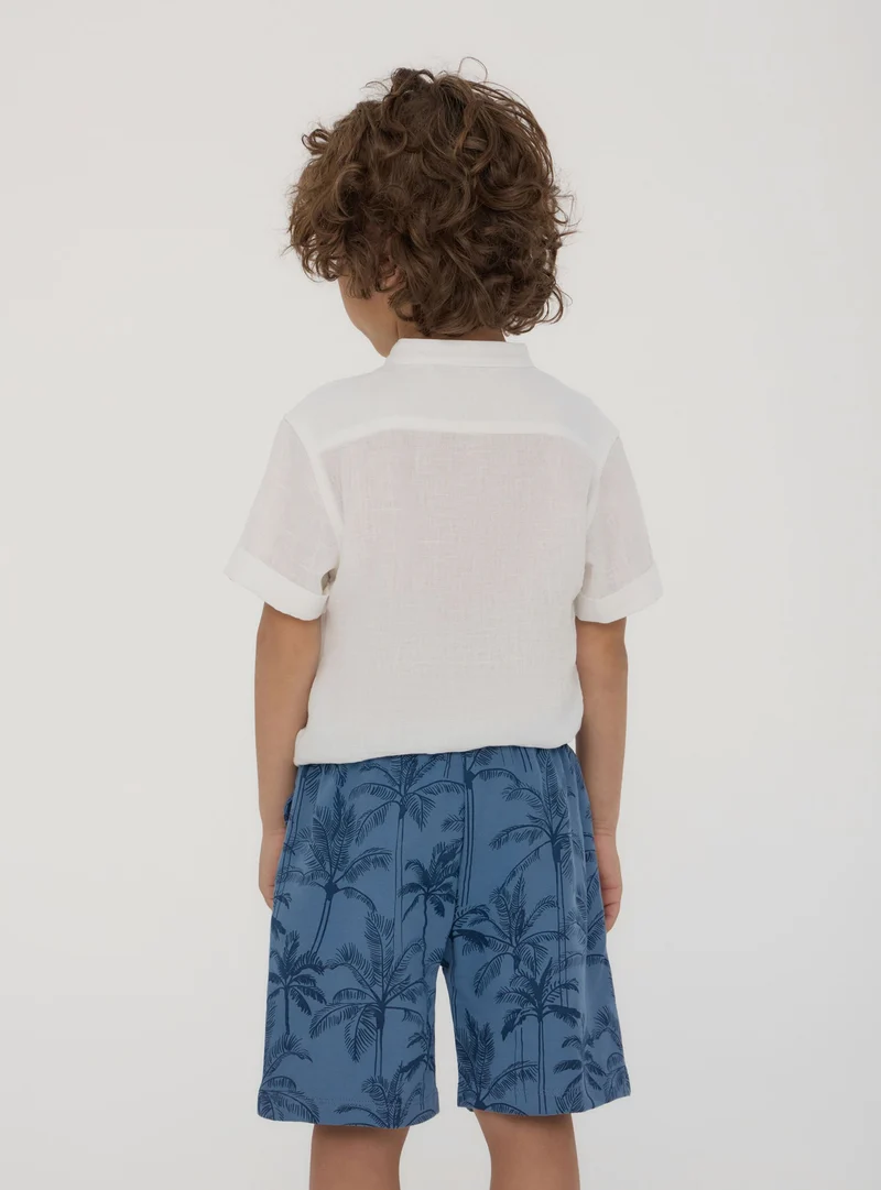 Pantaloncini tuta fantasia palme