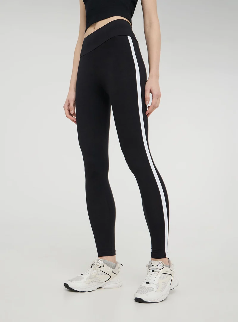 Leggings lunghi a vita alta con banda laterale