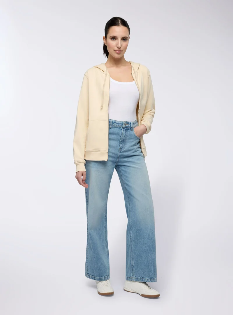 Jeans wide leg con risvolto