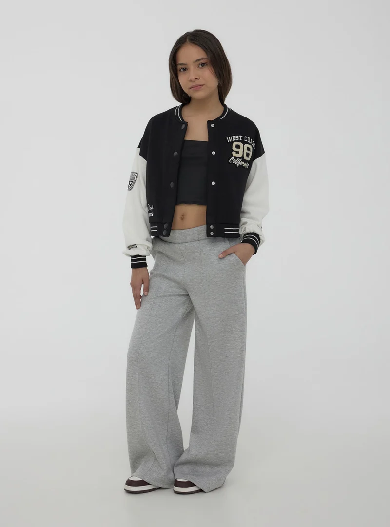 Giubbino bomber in felpa con patch