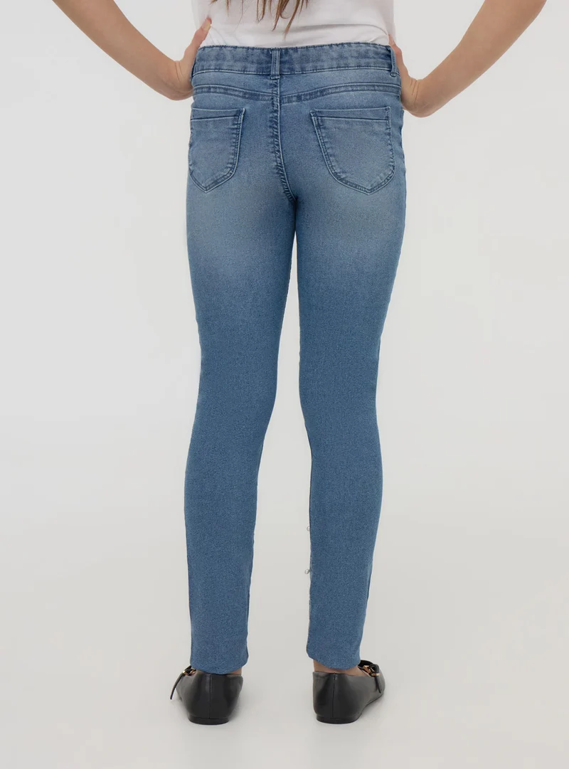 Jeans skinny con perle