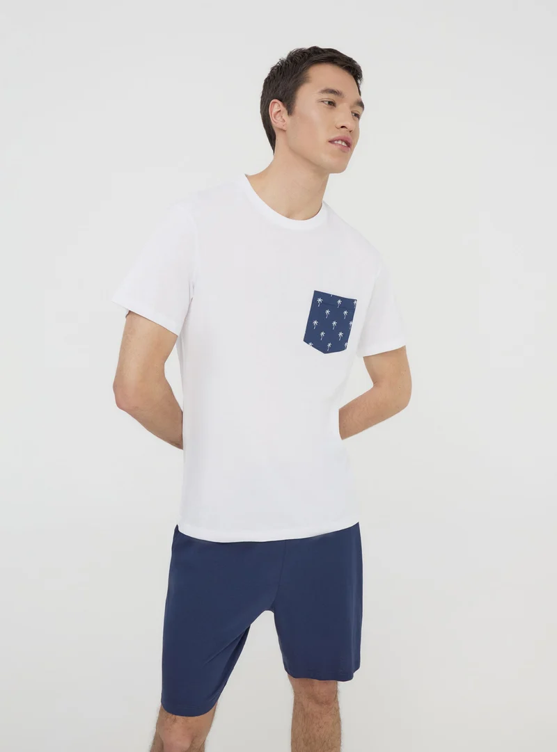 Set pigiama t-shirt con palme e bermuda