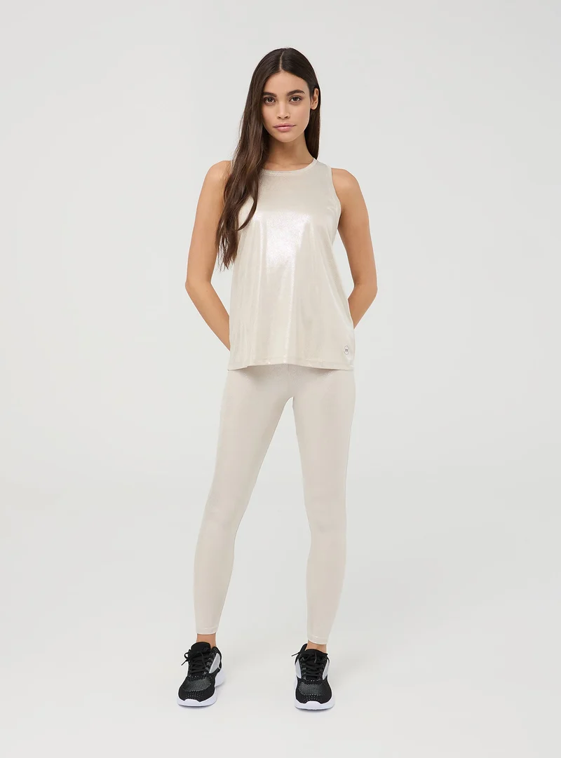 Leggings sportivi lucidi con tasca