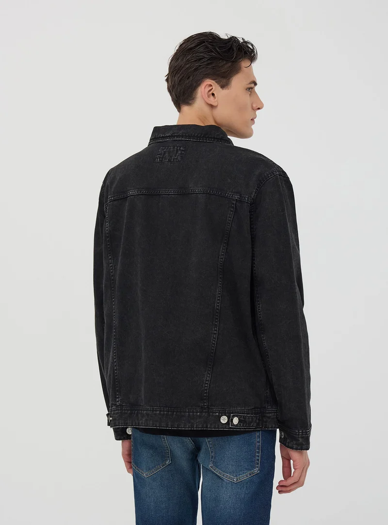 Giubbino di jeans con tasche